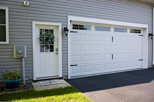 24/7 Emergency Garage Door Panel Replacement experts in Tylertown, MS